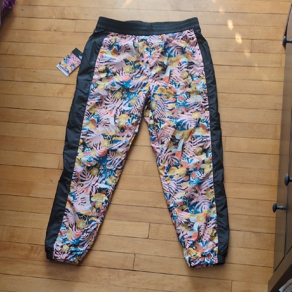 The North Face Pants - The North Face Pink Floral Joggers with Black Side Panels